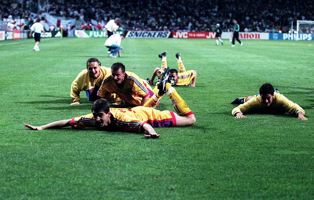 Romania celebrate their late victory over England at the 1998 World Cup