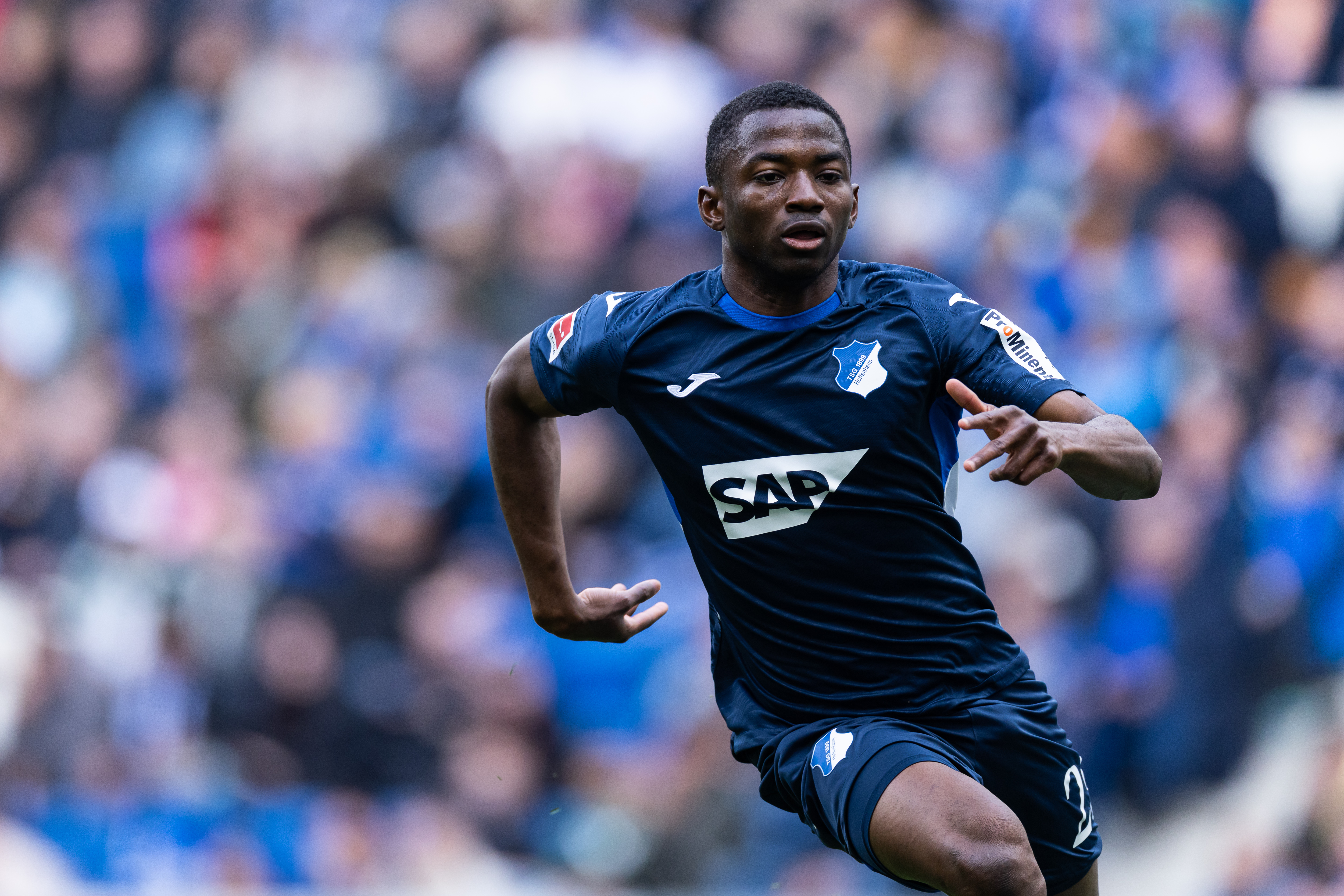 SINSHEIM, GERMANY - APRIL 04: Bazoumana Toure of Hoffenheim in action during the Bundesliga match between TSG Hoffenheim and 1. FSV Mainz 05 at PreZero-Arena on April 04, 2026 in Sinsheim, Germany. (Photo by Simon Hofmann/Getty Images)
